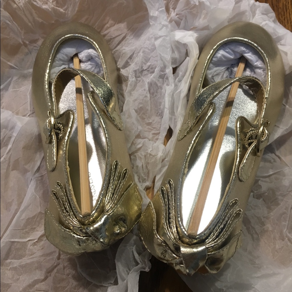 Little gold “ballet” shoes